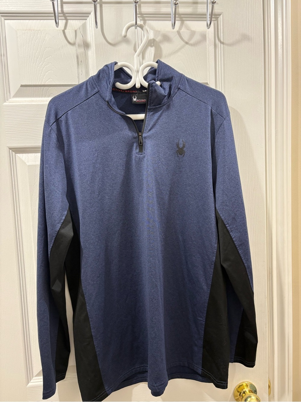 Navy blue and black Spyder quarter zip